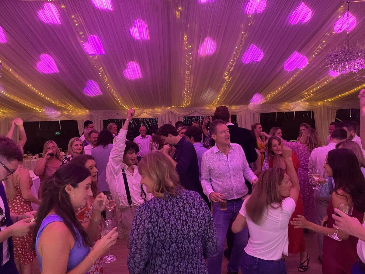 Dancefloor illuminated by vibrant lighting effects