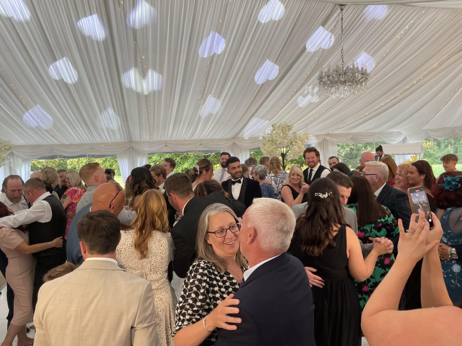 Motown wedding DJ setup with heart-inspired lighting and vintage style