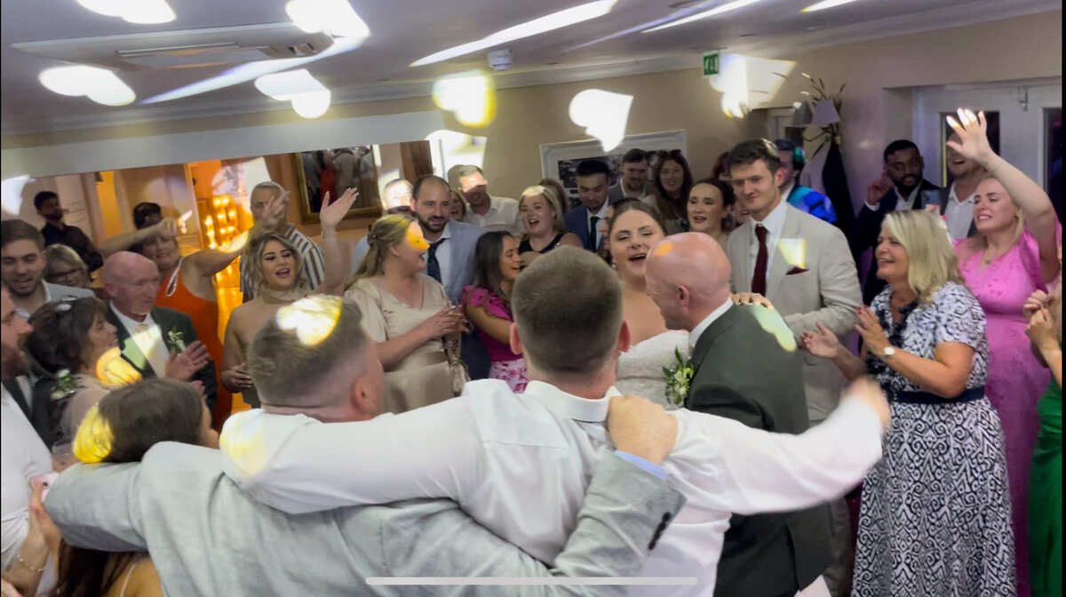 Guests dancing as the DJ builds the energy