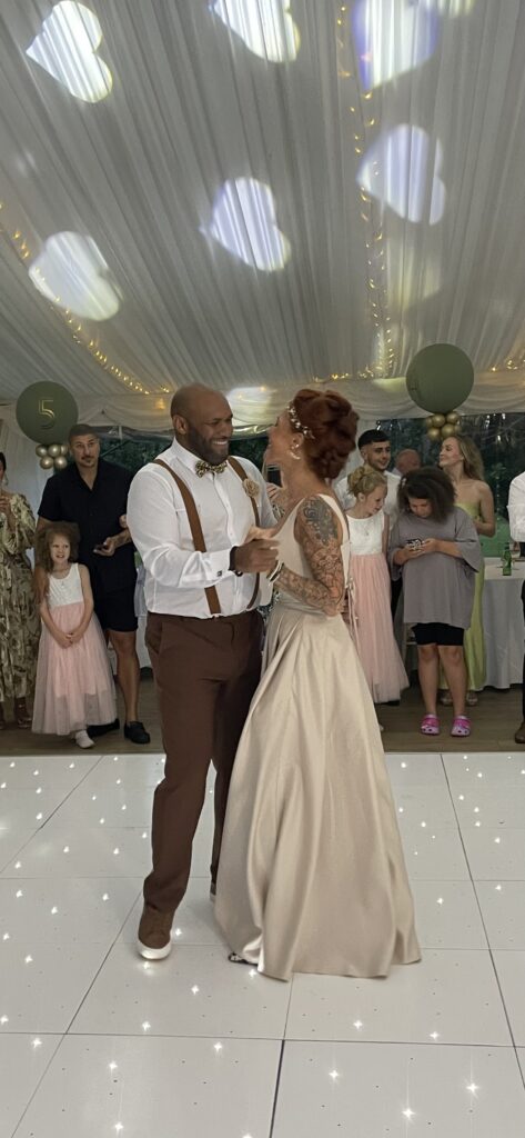Afrobeats Wedding DJ UK playing music at a multicultural wedding reception in Essex