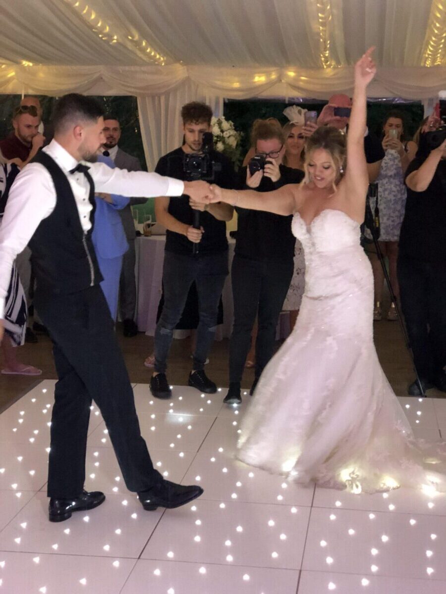 Bride and groom enjoying a flowing first dance