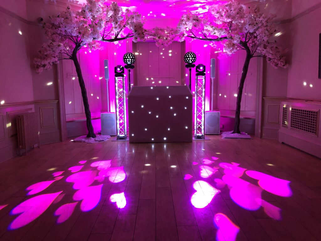 Diamond wedding DJ setup with heart lighting effects