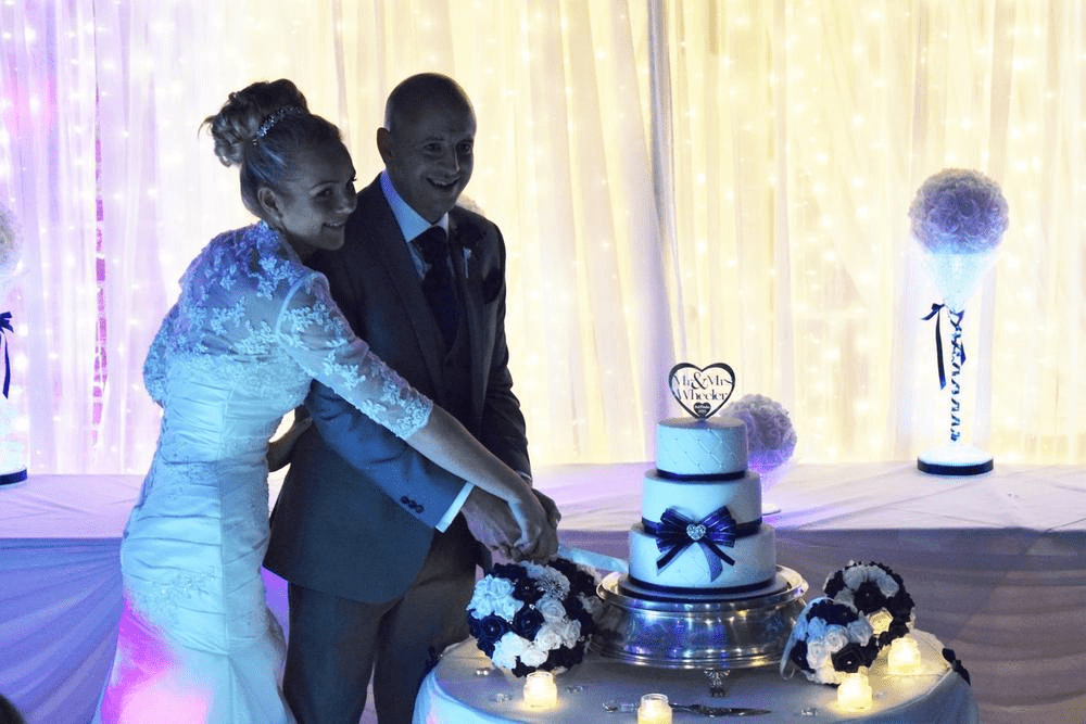 Couple enjoying their wedding reception with DJ playing