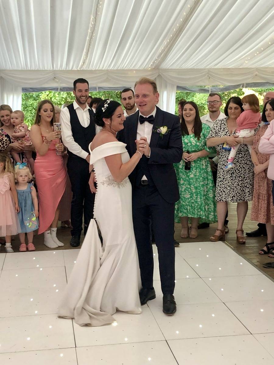 Couple enjoying a fun, upbeat first dance