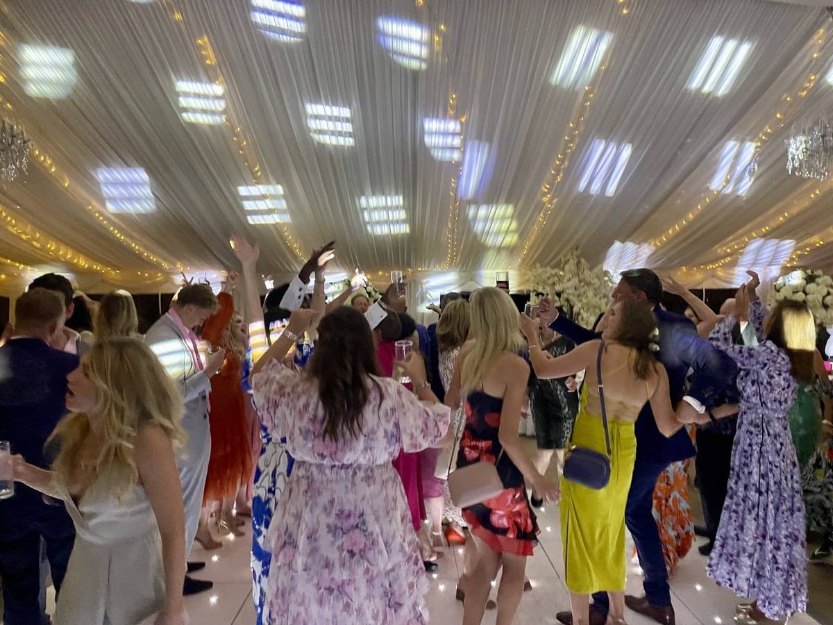 Lively dancefloor filled with happy guests