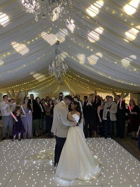 Bride and groom first dance at Mulberry House with DJ lighting