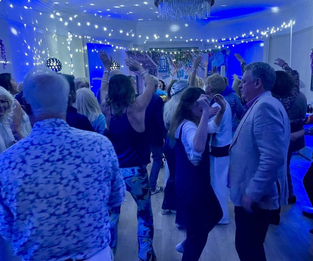 High-energy dancefloor moment at wedding