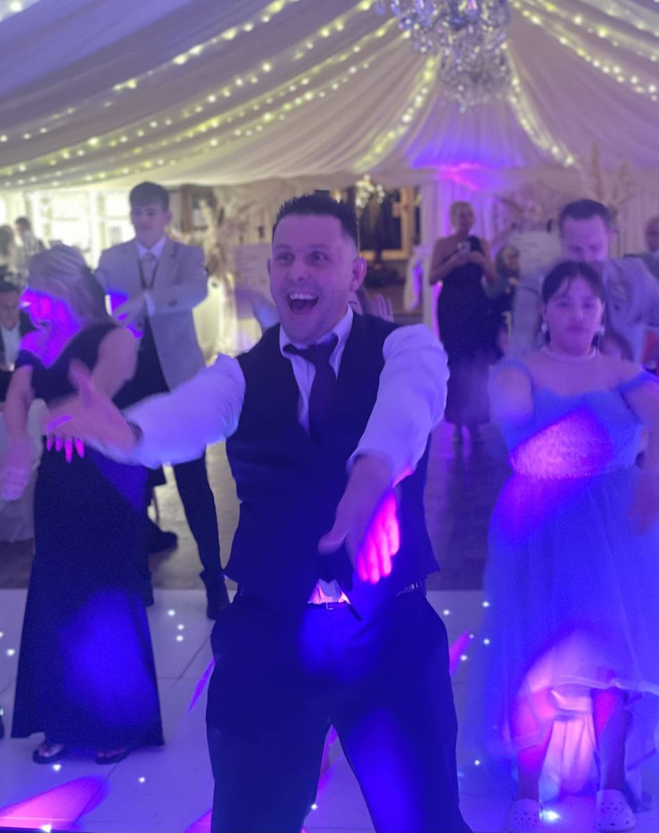 Guest leading a fun crowd participation moment